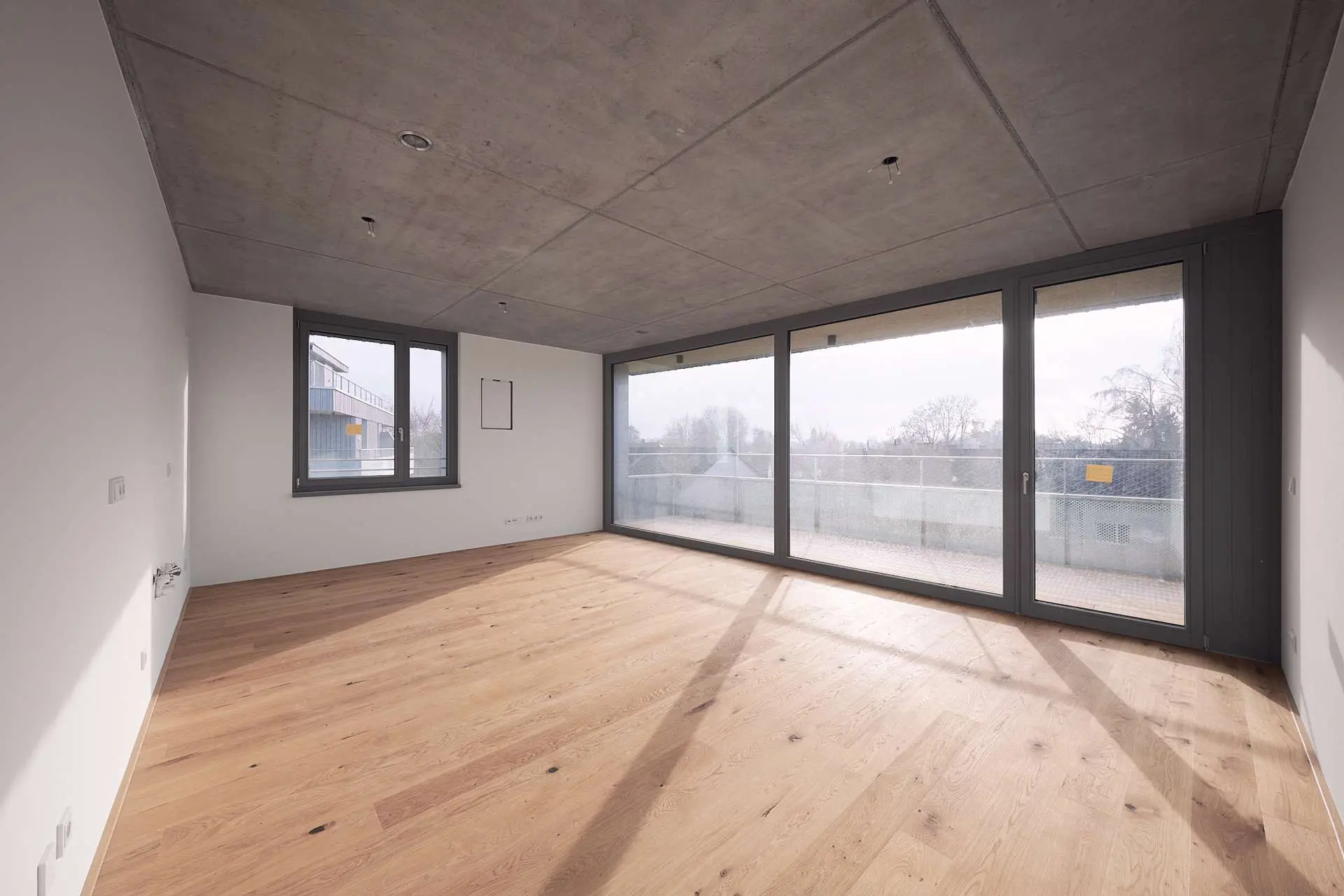 Wohnküche mit Blick zum Balkon - HERDERGÄRTEN 2.1.2